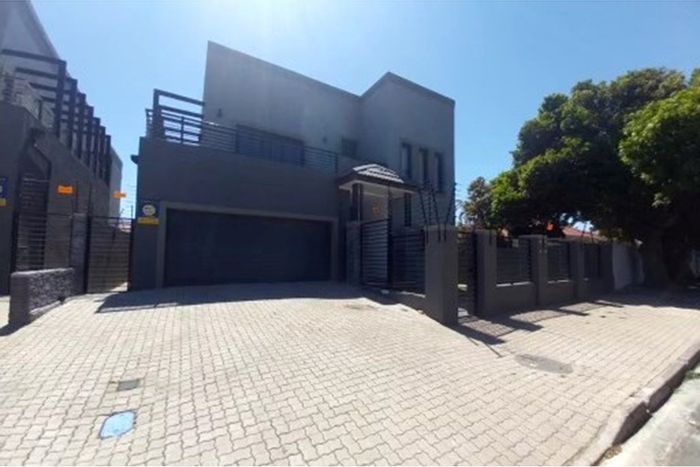 Spacious 5-bedroom house with ocean views, security, and wheelchair accessibility in Milnerton Central. For Sale.