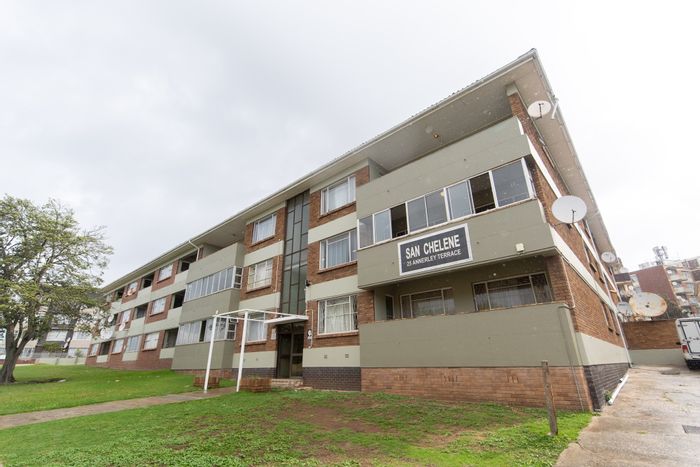 For Sale: Spacious Port Elizabeth Central Apartment with garage, security, and rental income.