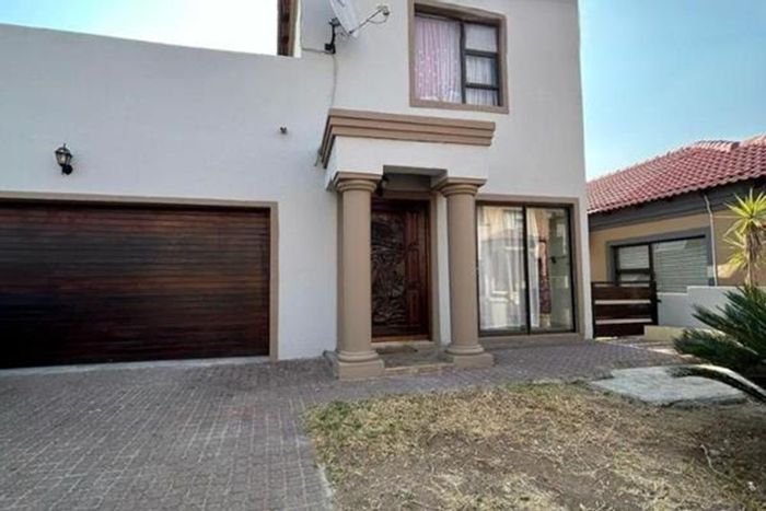 4 Bedroom House To Rent in Sagewood with garage, braai area, and security.