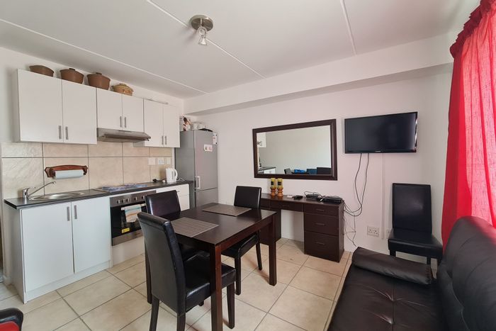 Klipkop Apartment For Sale: 1-bedroom, open-concept living, kitchen, easy access amenities.