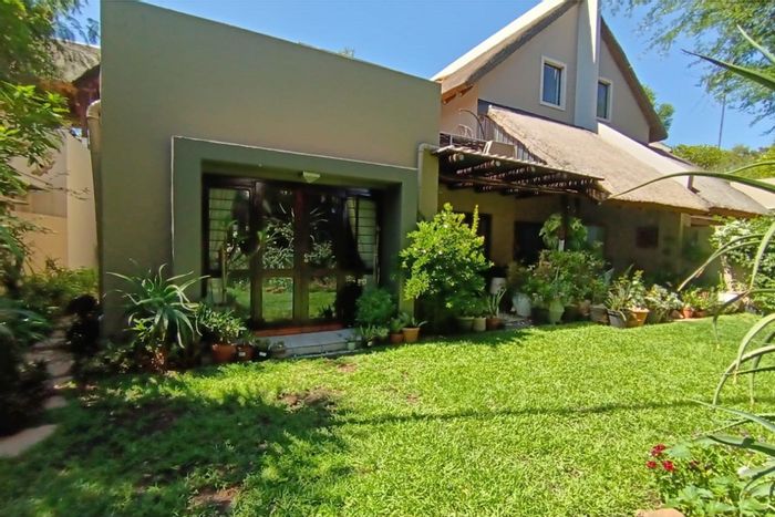 For Sale: Fourways Townhouse with garden, double garage, and estate amenities.