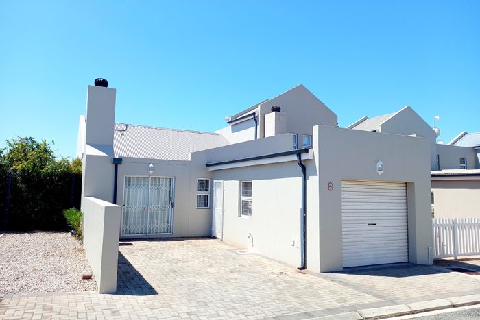 Villa Diamante House For Sale: Two bedrooms, open-plan living, indoor braai, garage.