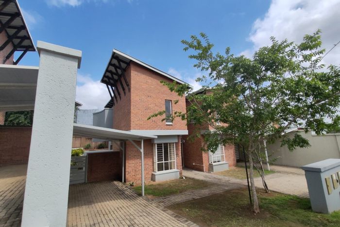 Townhouse for Sale in Nelspruit Ext 37: 2 beds, security, open-plan living.