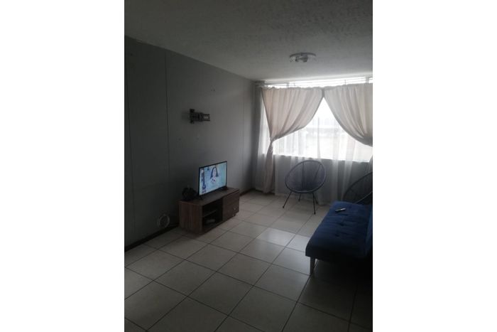 Umbilo Apartment For Sale: 2 beds, 1 bath, tenant-occupied, near amenities.
