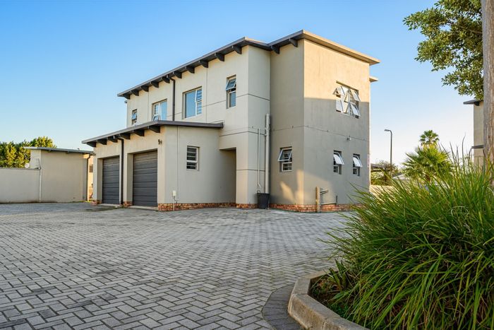 Greenshields Park Townhouse For Sale: Duplex with garage, enclosed yard, and patio.