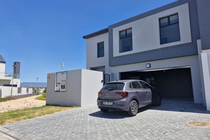 For Sale: 4-Bedroom House in Sandown with Braai Area and Double Garage.