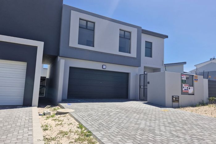 For Sale: House in Sandown with 3 bedrooms, garden, braai area, and secure garage.