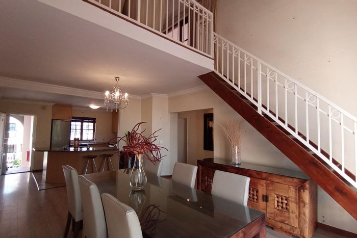 Edenburg Penthouse For Sale: Two balconies, en suite bedrooms, communal pool access.