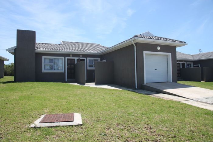 House to Rent in Kidds Beach: 3 bedrooms, built-in braai, secure estate living.