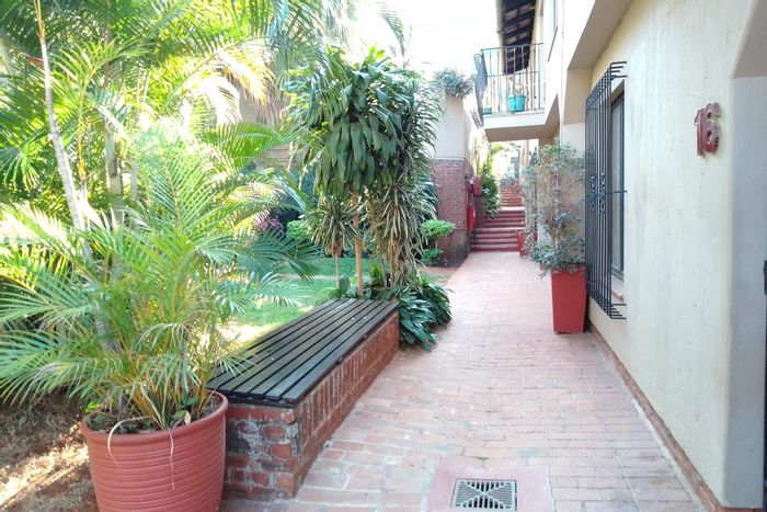 For Sale: Townhouse in Musgrave with private garden, garage, and communal pool.