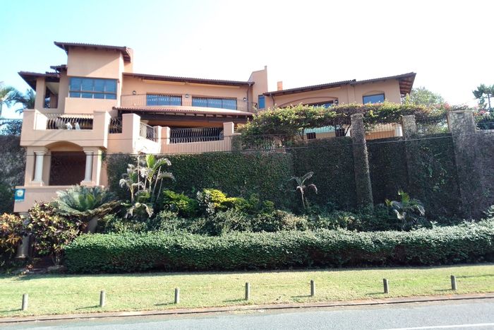 For Sale: House in Umhlanga Central with beach access, pool, and entertainment area.