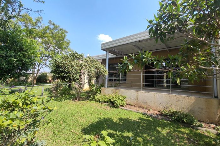 Townhouse For Sale in Nelspruit Ext 29: Pool, garden, garage, and retirement amenities.