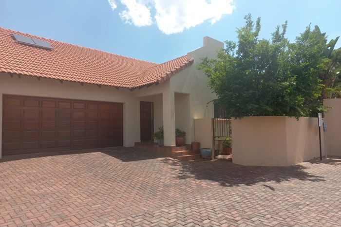 For Sale: House in Safari Gardens with 3 bedrooms, double garage, and built-in braai.