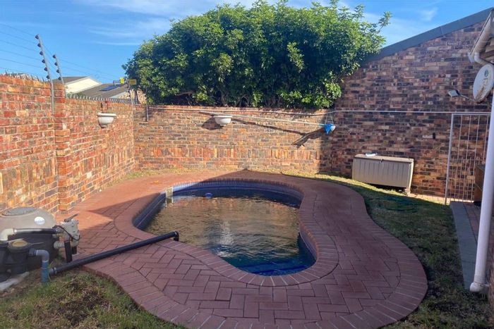 For Sale: House in South End with pool, garden, secure parking, and braai area.