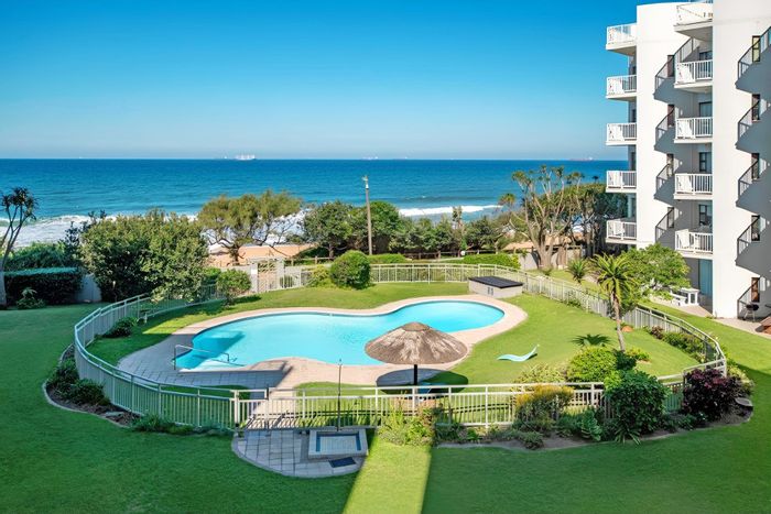 Coastal apartment for sale in Selection Beach with pool and private beach access.