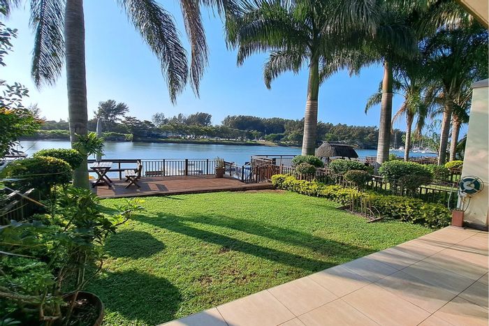 House For Sale in Tuzi-Gazi: 4 Bedrooms, gated estate, waterfront views, pet-friendly.
