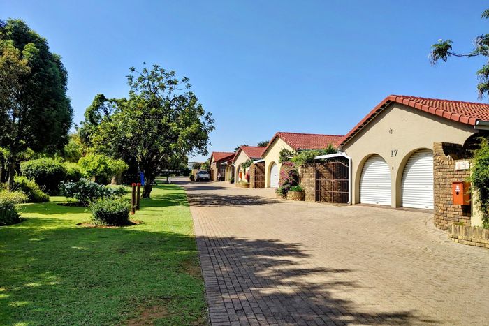 For Sale: Glen Marais Townhouse with double garage, solar system, and braai area.