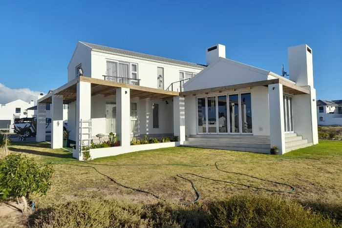 For Sale: House in Shelley Point with golf views, approved plans, and water features.