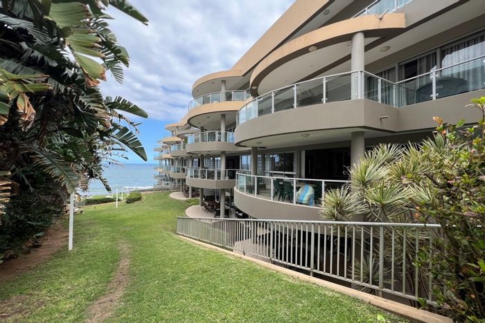 Beachfront apartment in Ballito Central for sale with pool and direct promenade access.