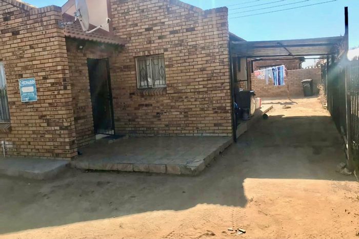 For Sale: House in Mmabatho Unit 13 with three bedrooms and parking spaces.