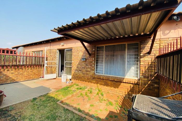 Vaalpark Apartment For Sale: Two bedrooms, private garden, secure complex, close to amenities.