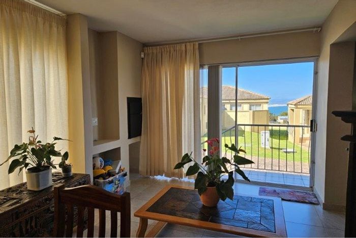 Wavecrest Townhouse For Sale: 3 bedrooms, open-plan living, built-in braai, ocean views.