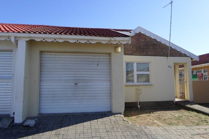 For Sale: 2-Bedroom Townhouse in West Bank with security features and enclosed yard.