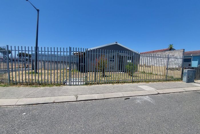 For Sale: House in Portlands with garage, parking for six, and rental income potential.