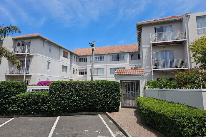 Rondebosch Village Apartment For Sale: 2 beds, pool, secure parking, pet-friendly.