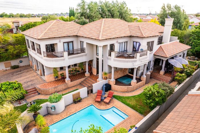 For Sale: House in Midstream Estate with guest apartment, pool, and staff quarters.