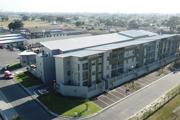 Edgemead Apartment For Sale: 2 Bedrooms, dedicated parking, open-plan living space.