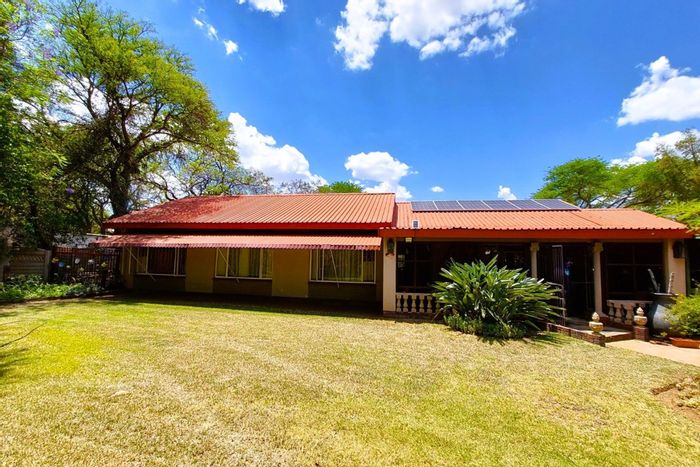 Four-bedroom house for sale in Bela Bela Central with outdoor braai and study.