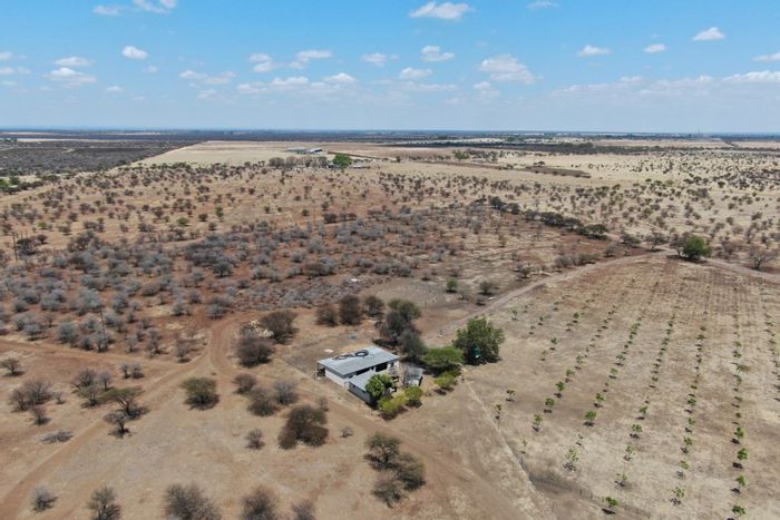 Radium Small Holding For Sale: 5 homes, solar power, pecan orchard, event venue.
