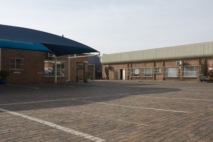 For Sale: Office in Vanderbijlpark CE 6 with 12 offices, warehouse, and parking.