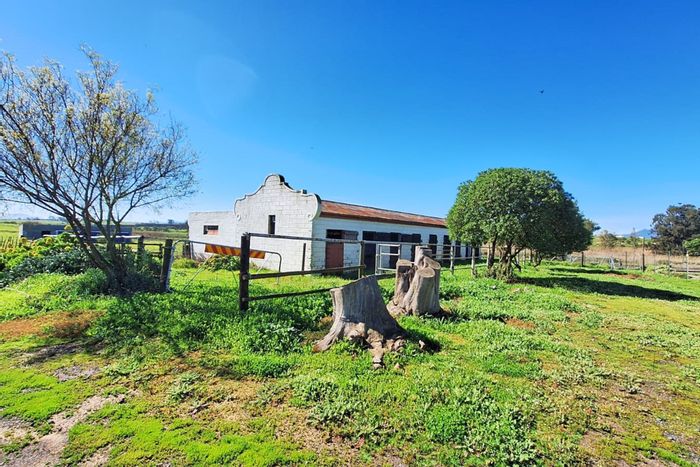 Durbanville Rural Farm For Sale: 57 hectares, retail space, bottling facility, event potential.