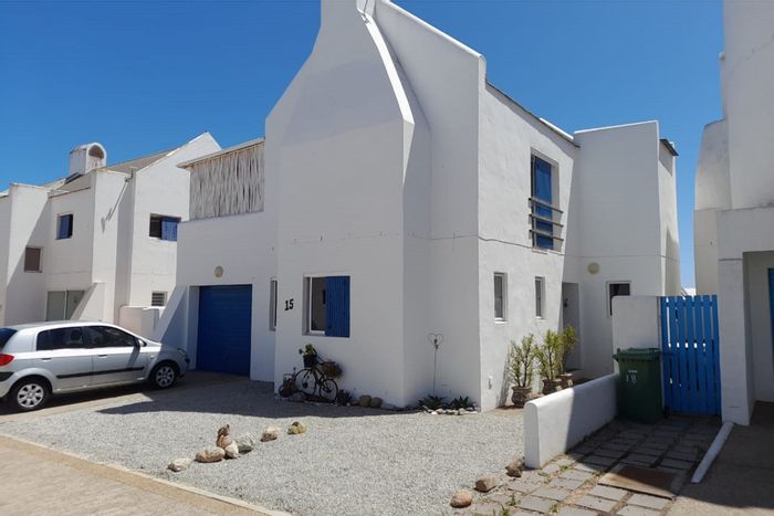 House for Sale in Lampiesbaai: Open-plan living, built-in braai, near beach.