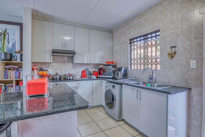 Kyalami Hills Townhouse For Sale: 3 beds, 2 baths, garage, balcony, pet-friendly.