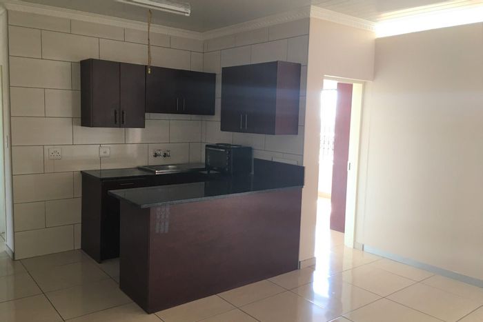 Two-bedroom apartment in Bo Dorp, first floor, carport, water included. To Rent.