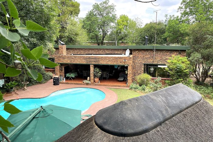 Spacious Henley On Klip house with pool, cottage, gardens, and ample parking for sale.