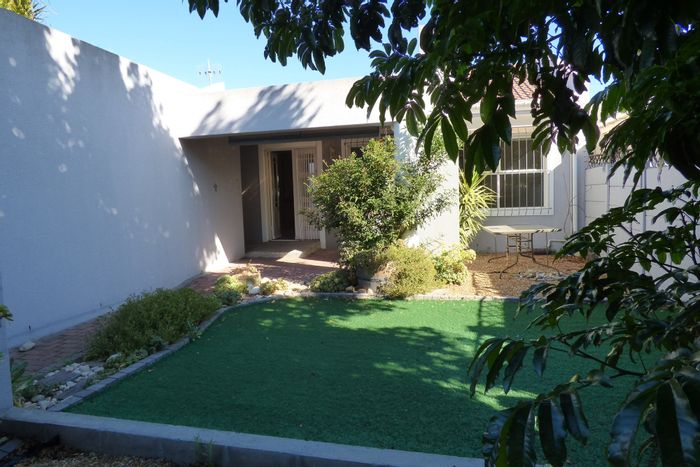 For Sale: 3-Bedroom House in Parklands with garage, security, and garden access.