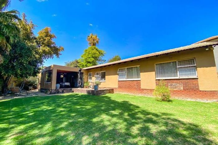 4-Bedroom House For Sale in Birch Acres with spacious living areas and parking.