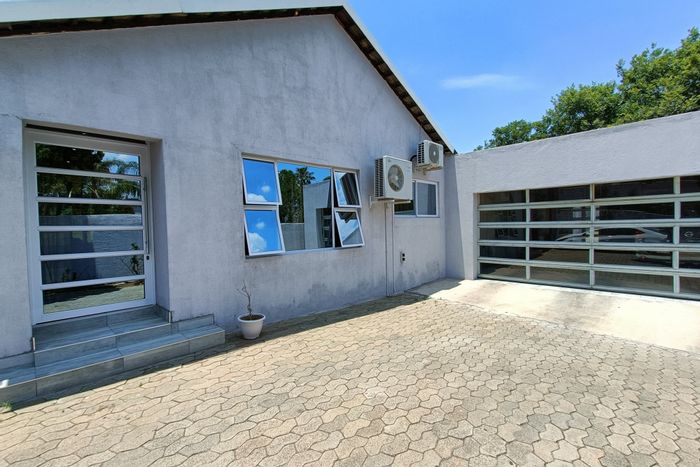 For Sale: House in Vorna Valley with flatlet, double garages, and solar panels.