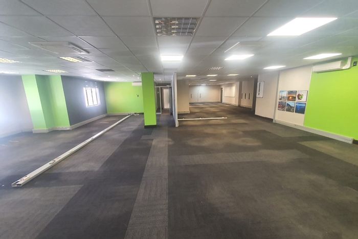 403m2 Office To Rent in Newton Park with secure parking and versatile layout.