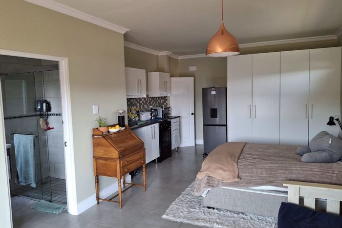 House for Sale in Knysna Central: Income-generating flatlets, double garage, scenic views.