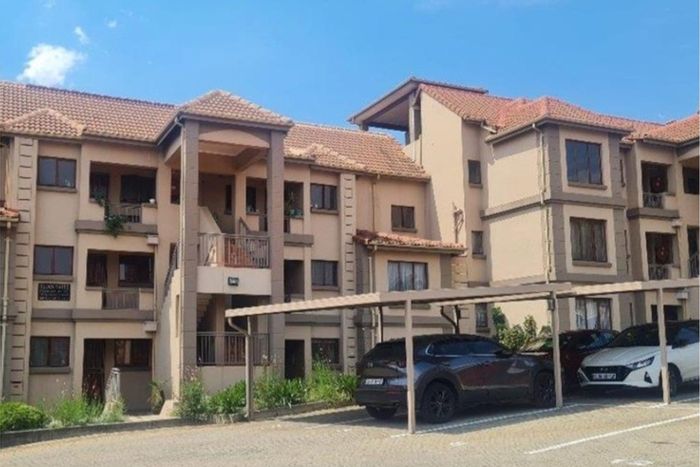 For Sale: Townhouse in Dowerglen Ext 4 with pool, security, and two carports.