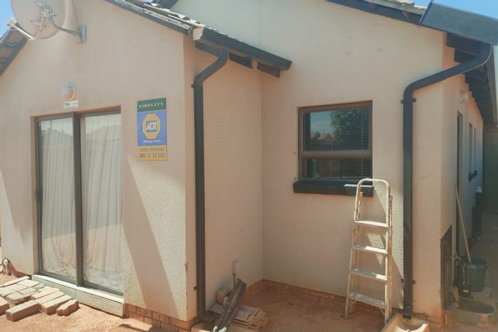 House for Sale in Soshanguve Ext: Three bedrooms, yard, business potential, near amenities.