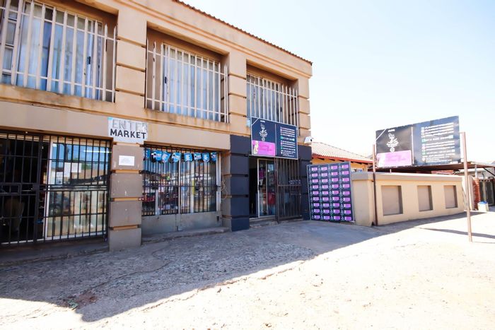 For Sale: House in Vosloorus with multiple rental units and commercial amenities.