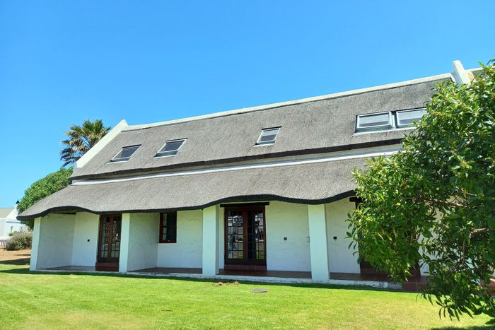 House for Sale in Jacobsbaai: Beach proximity, pool, indoor braai, commercial rights.