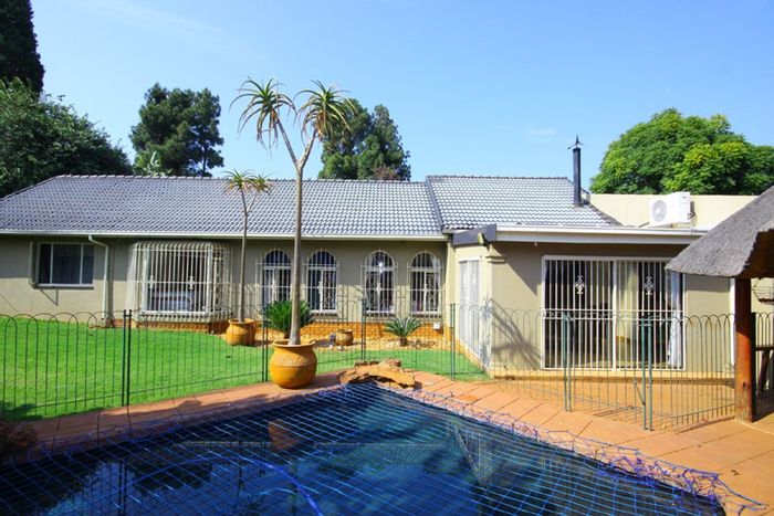 For Sale: Weltevreden Park House with flatlet, pool, and expansive yard.