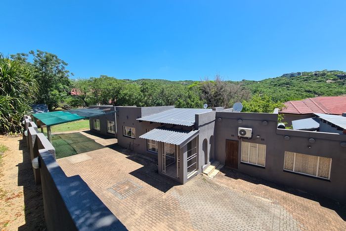 For Sale: Dual-home property in Nelspruit Ext 13 with pool and ample parking.